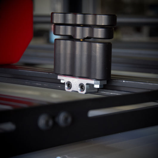 Billet aluminum Rotopax mount adapter for extrusion roof rack cross bars.