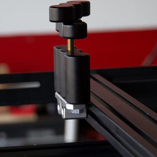 Billet aluminum Rotopax mount adapter for extrusion roof rack cross bars.