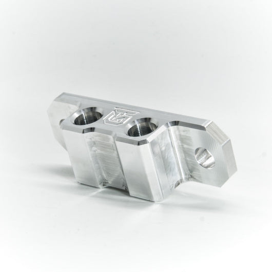 Billet aluminum Rotopax mount adapter for extrusion roof rack cross bars.