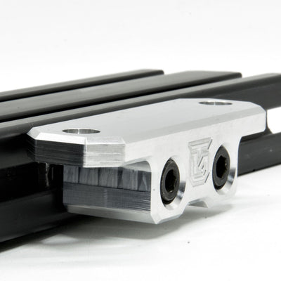 Billet aluminum Rotopax mount adapter for extrusion roof rack cross bars.