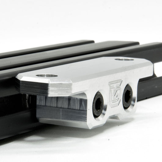 Billet aluminum Rotopax mount adapter for extrusion roof rack cross bars.