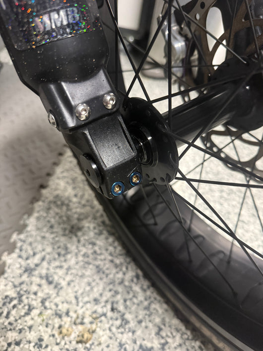 Super 73 titanium front wheel clamp