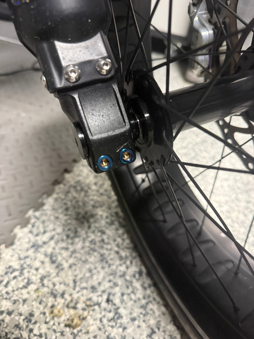 Super 73 titanium front wheel clamp